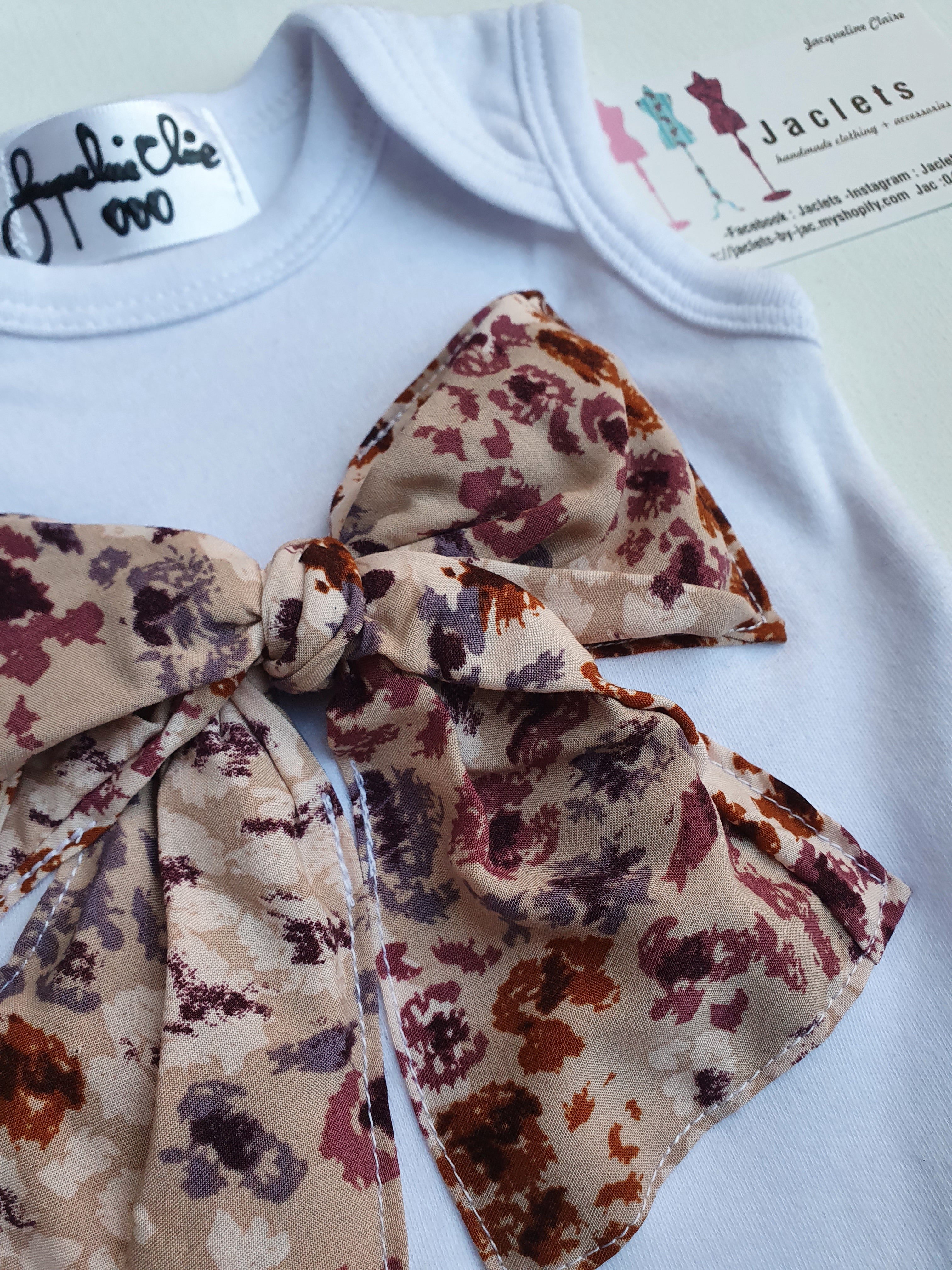 White "Zaraffah" Babysuit - Size 000